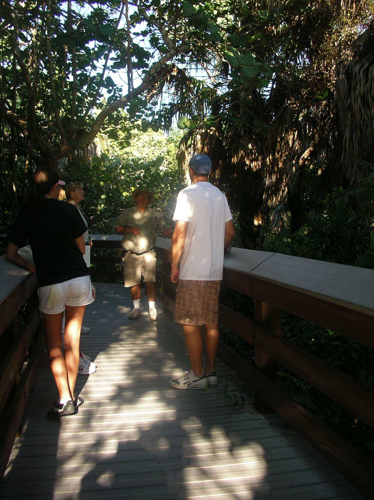 ranger does nature talk on boardwalk with volunteer